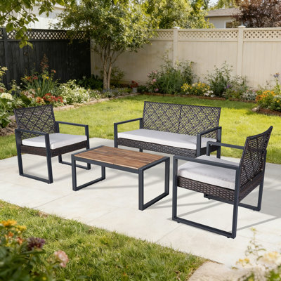 Ensemble de conversation de patio en osier 4 pièces avec table basse