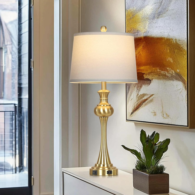 Lampe de table dorée