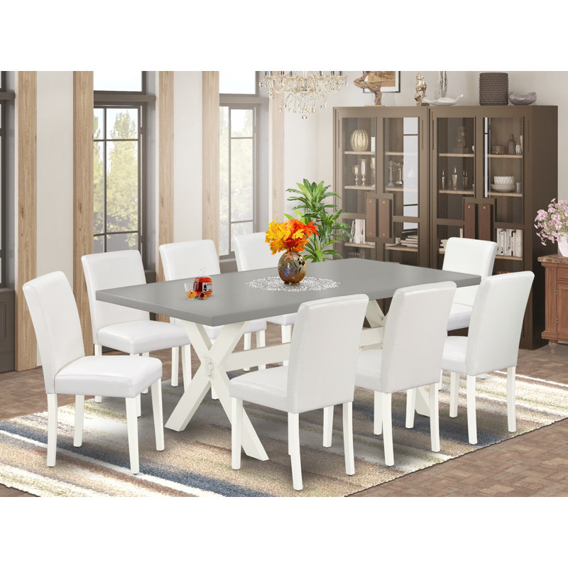 9 Piece Dining Table Set Includes a Rectangle Kitchen Table with X-Legs and 8 White Faux Leather Parson Dining Room Chairs, 40x72 Inch, Multi-Color