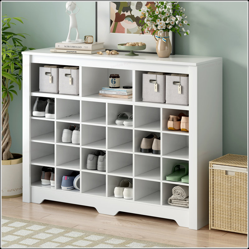 Console à chaussures polyvalente et moderne avec base incurvée pour plusieurs pièces, offrant beaucoup de rangement et un design élégant