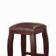 Tabouret en bois avec assise rembourrée et bordure cloutée