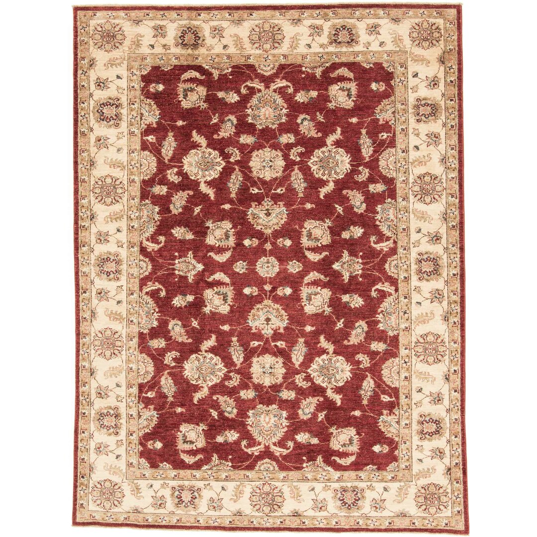 Handgefertigter Teppich aus Wolle in Rot/Beige