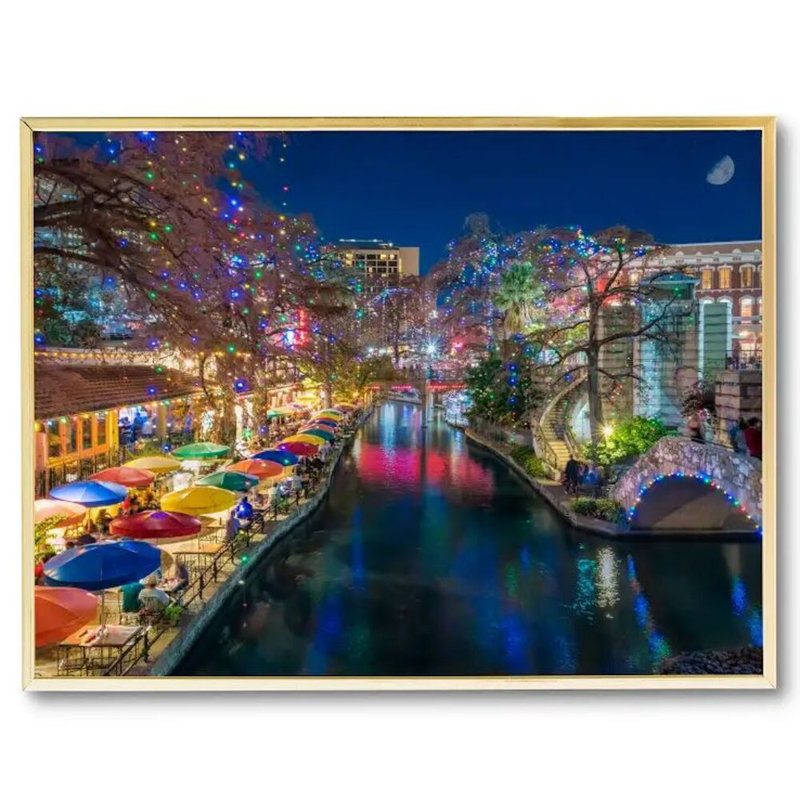 A San Antonio Holiday by Beth Sheridan, 38" H x 50" W x 2" D, Gold Floater Framed Canvas, No Mat