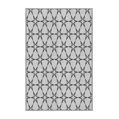 Tapis noir à motifs géométriques