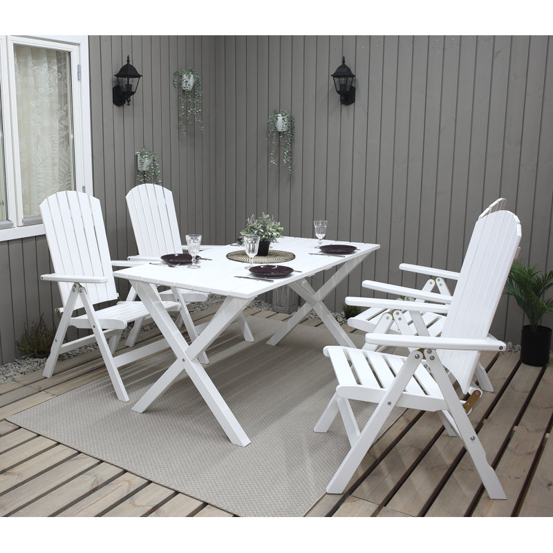 Capuano 4 - Person Solid Wood Patio Dining Set Rectangular Table