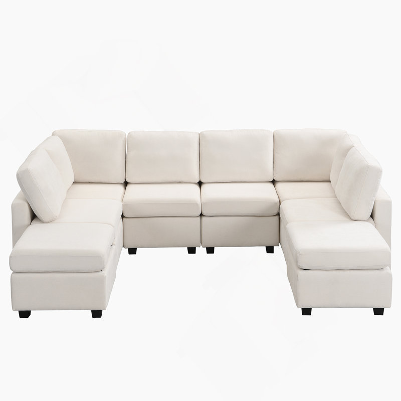 Canapé beige en chenille à accoudoirs carrés