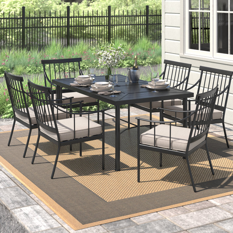 Milnor Rectangular 6 - Person 64'' Long Outdoor Patio Dining Set Furniture with Cushions