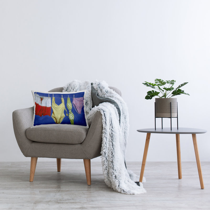 Coussin décoratif à motif de maillots de bain sur corde à linge, design par Grace Popp
