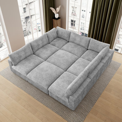 9 - Piece Upholstered Sectional With Ottoman