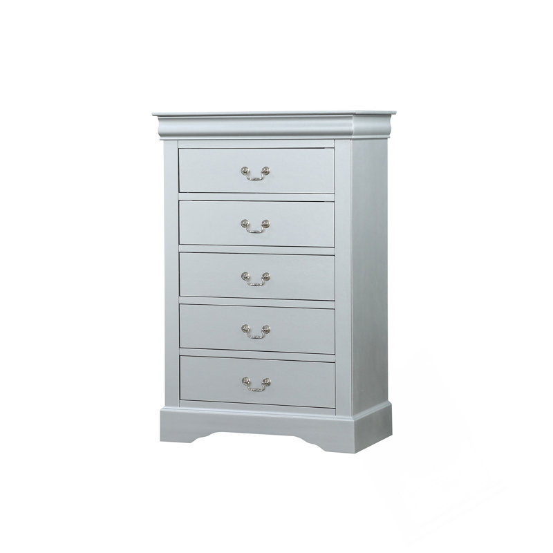 Commode moderne avec cinq tiroirs spacieux, des glissières lisses et une fabrication en queue d'aronde durable pour un rangement organisé.