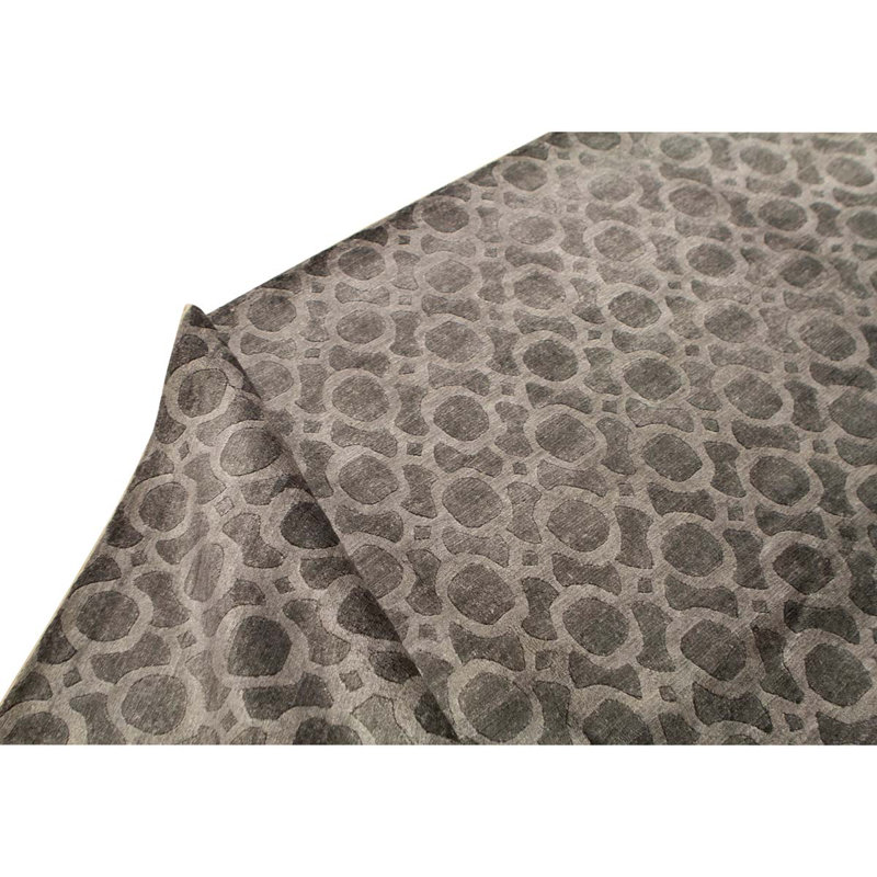 Tapis gris noué à la main