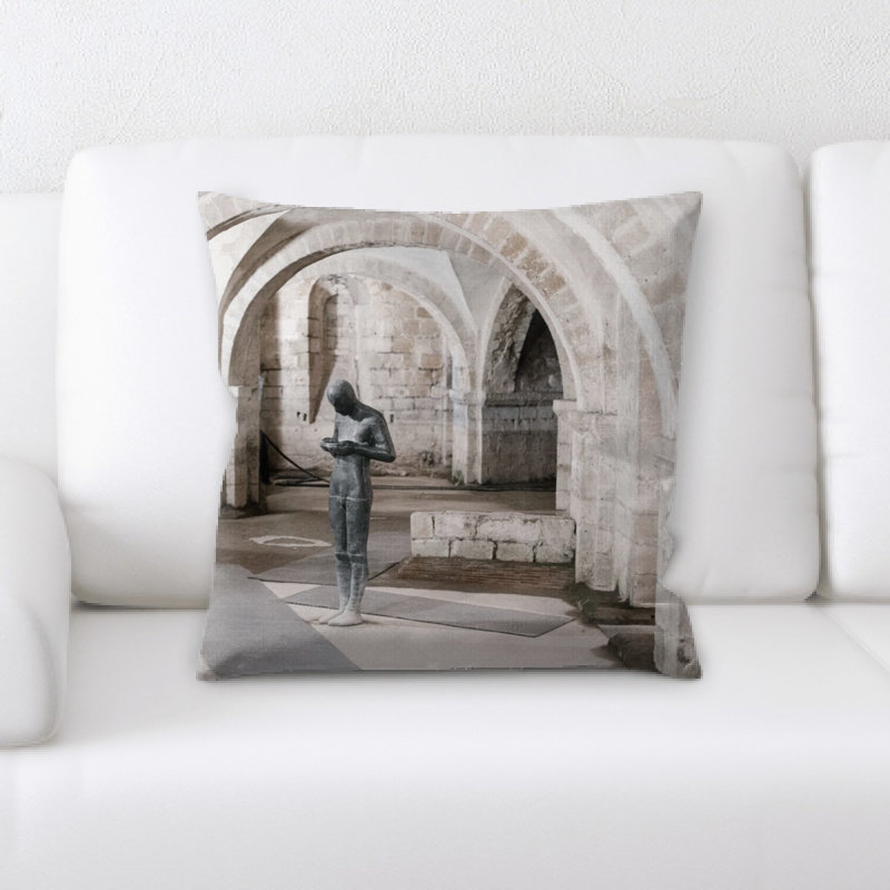Coussin statue