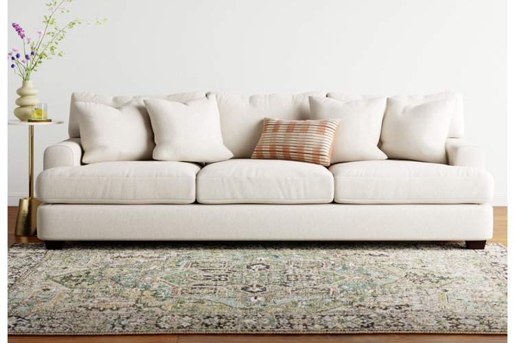 white sofa with matching toss pillows