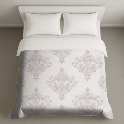 Housses de couette à motif damassé orné
