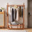 Solid Wood Freestanding Clothing Garment Rack, Mobile Wooden Clothes Hanger Stand with Lockable Wheels, Multi‑Hook Hanging Rod & Large Bottom Storage Basket