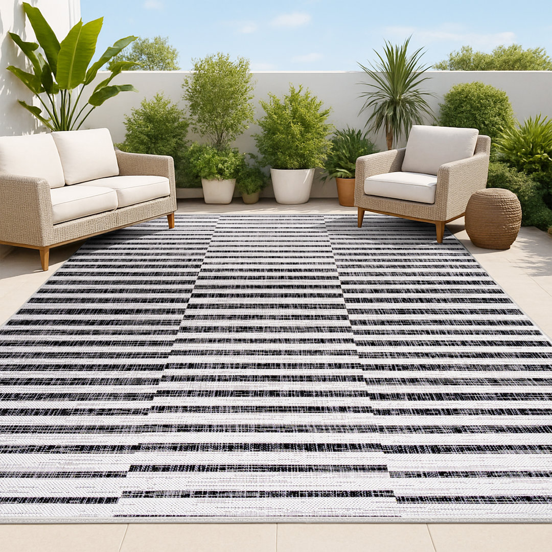 Aubriella Modern Offset Stripe Ivory/Black Indoor/Outdoor Rug Zipcode Design™ Rug