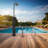 89 in. H Solar Powered Temperature Controlled Portable Plastic Free Standing Outdoor Shower with Detachable Shower Head and Footwash Spout and Duckboard