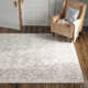 Camino Geometric Handmade Tufted Wool Area Rug in Taupe