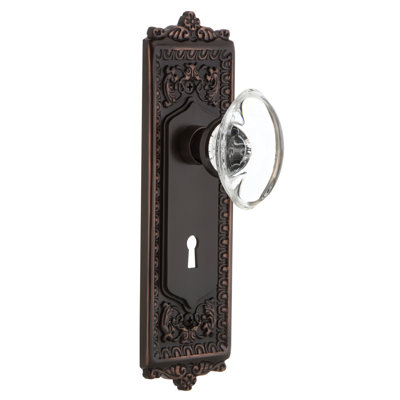 Egg & Dart Plate with Decorative Keyhole and Oval Clear Crystal Door Knob