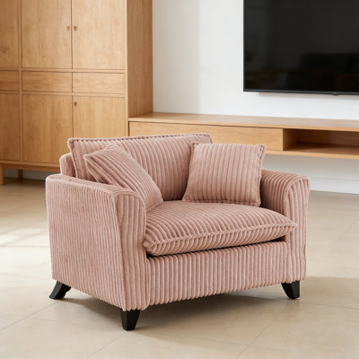 Single sofa with two pillows and sturdy legs