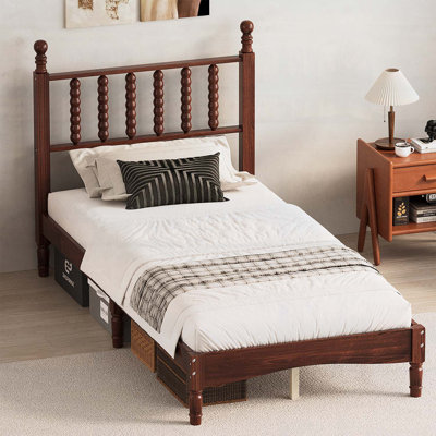 Lit plateforme de style rétro avec tête de lit en forme de gourde et support en lattes de bois