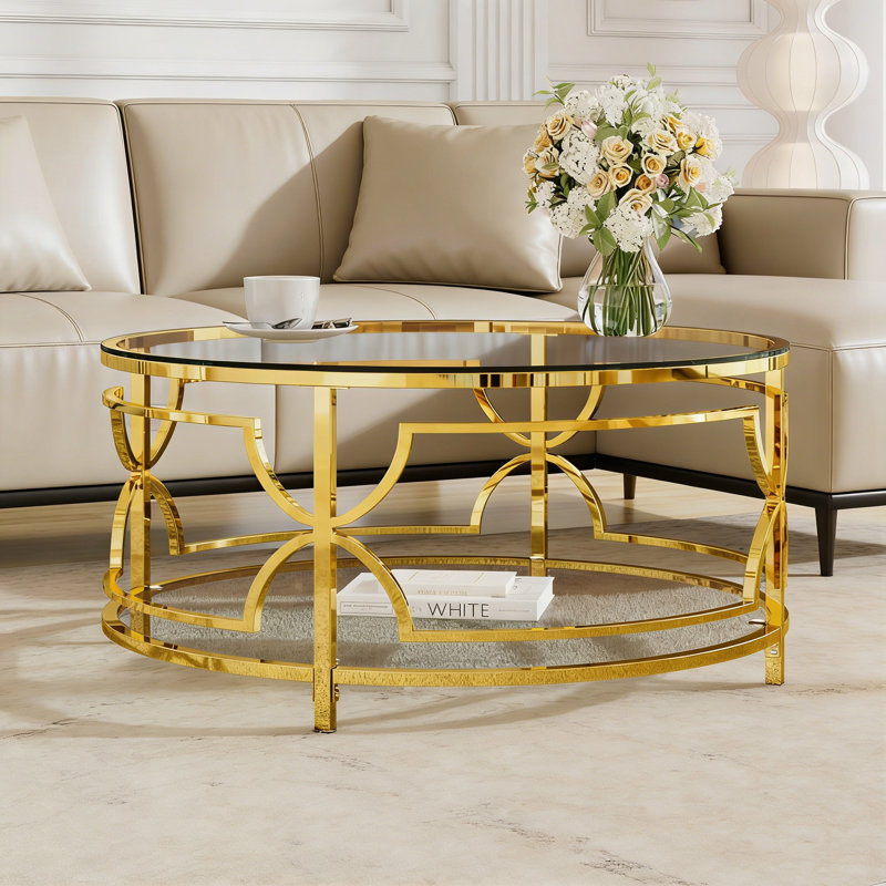 Table basse ronde avec plateau en verre trempé, structure en métal géométrique et tablette inférieure, Transparent