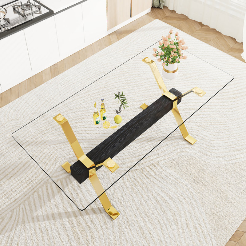 Table de salle à manger en verre transparent avec structure en métal pour les espaces de bureau à domicile