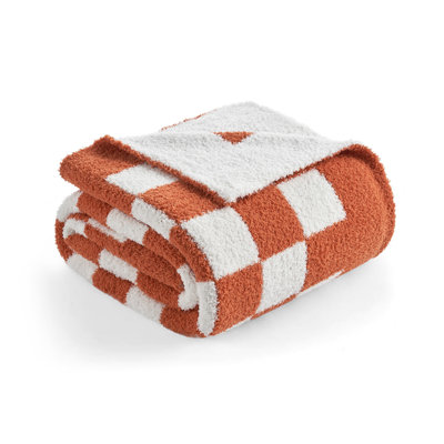 Jeté réversible en tricot à carreaux