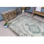 Découvrez un élégant tapis turc rétro à motifs floraux vert et beige pastel pour un décor de salon bohémien
