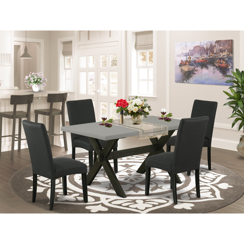 L'ensemble de table de salle à manger 5 pièces pour 4 personnes comprend une table de cuisine rectangulaire avec pieds en X et 4 chaises rembourrées en tissu de couleur noire, noir brossé