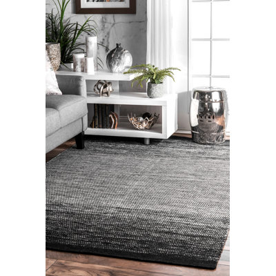 Tapis en coton/laine noire Charmine