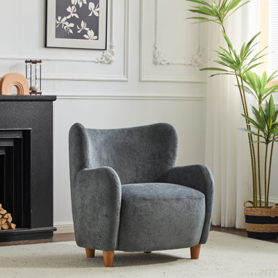 Fauteuil d'appoint incurvé rembourré à oreilles