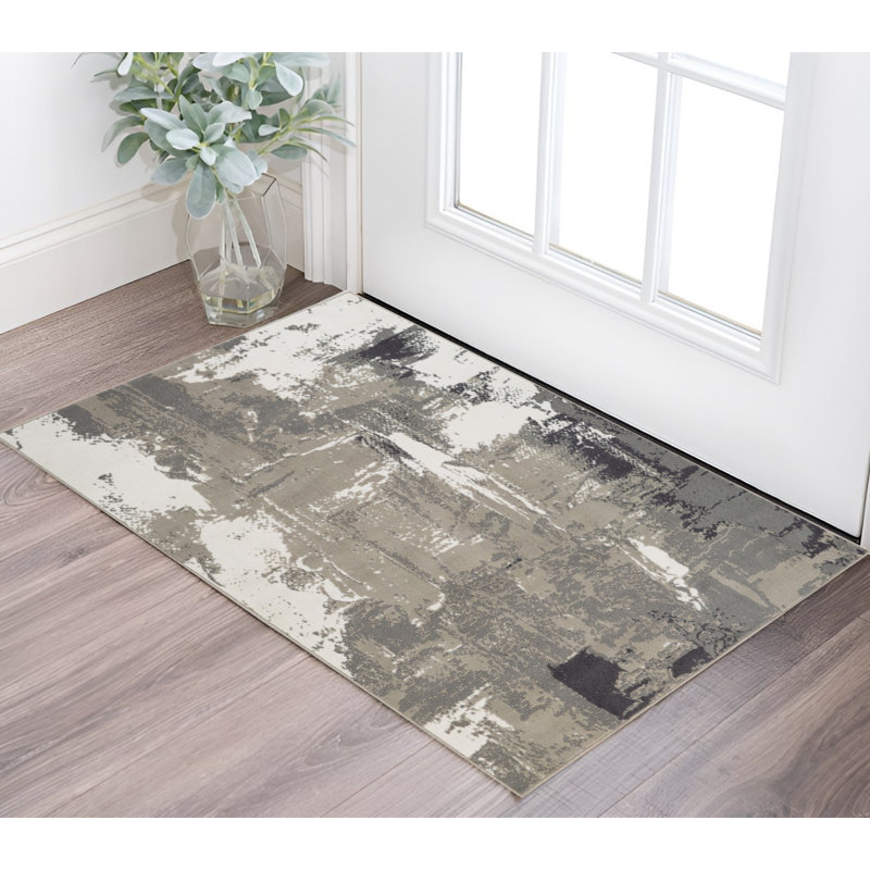 Tapis noir et gris à tissage mécanique abstrait 2 pi x 3 pi