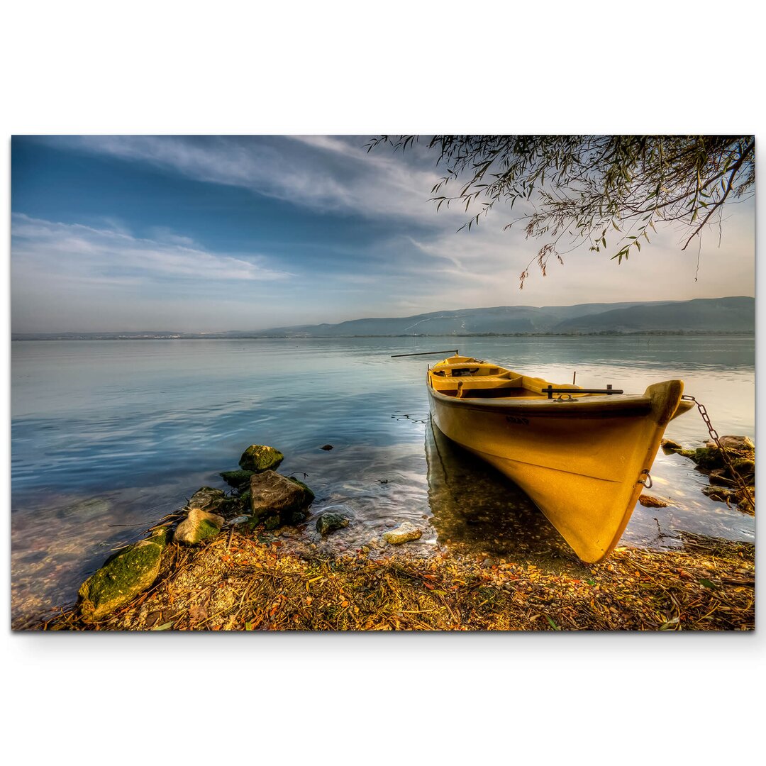 Leinwandbild Gelbes Boot am Ufer