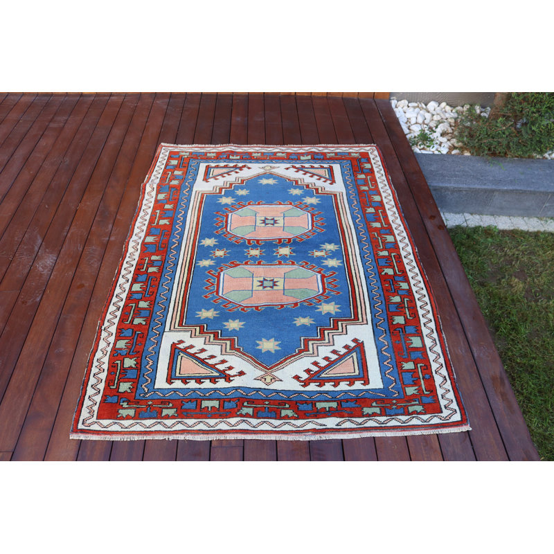 Tapis traditionnel turc tissé à la main dans des tons chauds pour un décor douillet
