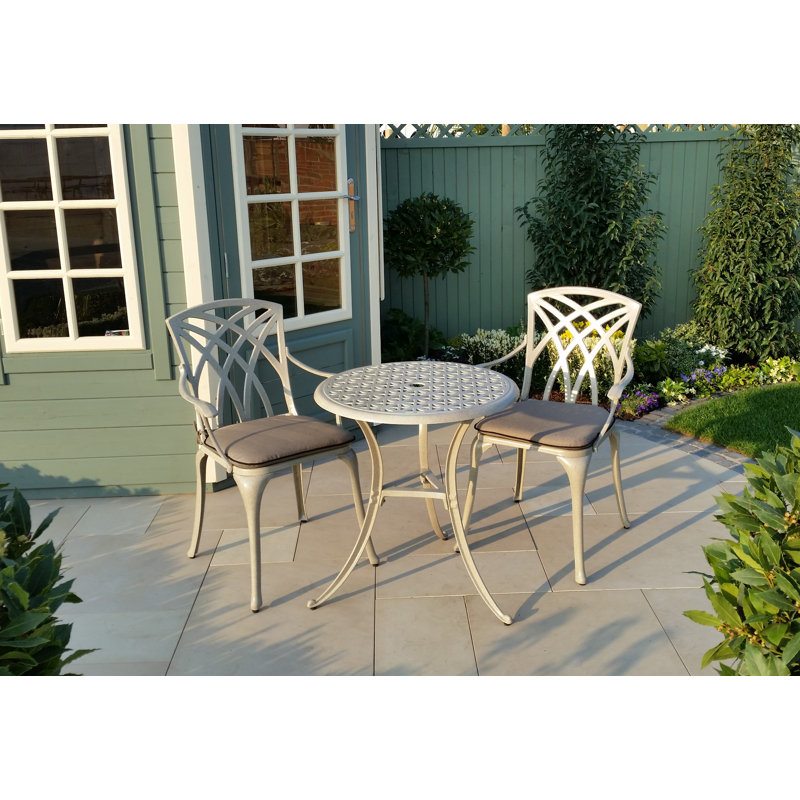 Ryne 2 - Person Patio Dining Set with Round Table , Cushions Included, Sandstone