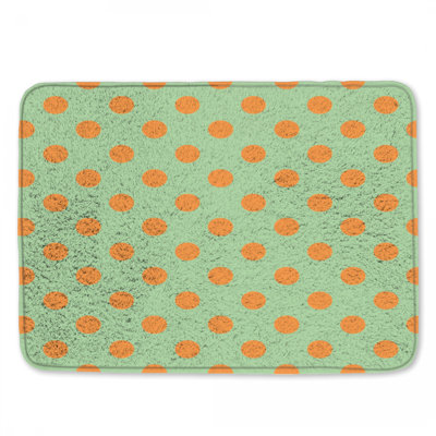Tapis de bain orange à pois