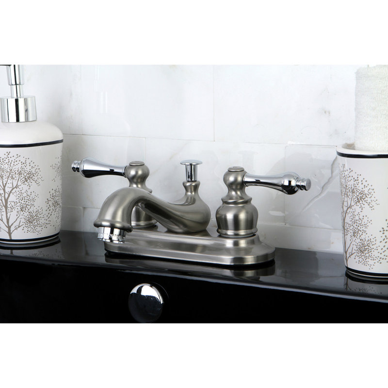 Kingston Brass Restoration Two-Handle 3-Hole Deck Mount 4" Centerset Bathroom Faucet with Brass Pop-Up