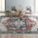 Dickison Oriental Blue/Rust/Cream Area Rug