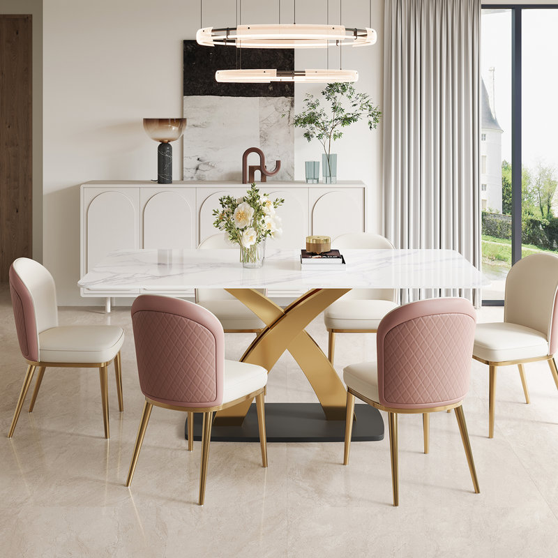 Ensemble de table de salle à manger moderne en pierre frittée avec chaises en similicuir et base en X