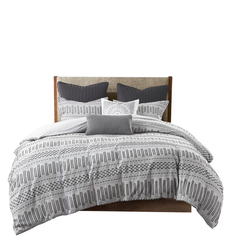 Literie douillette en coton gris avec des accents noirs à rayures horizontales multicolores