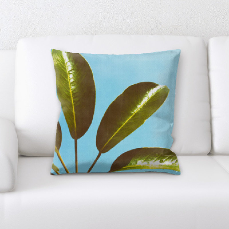 Coussin de feuille de plante à l’avant d’un coussin décoratif arrière-plan