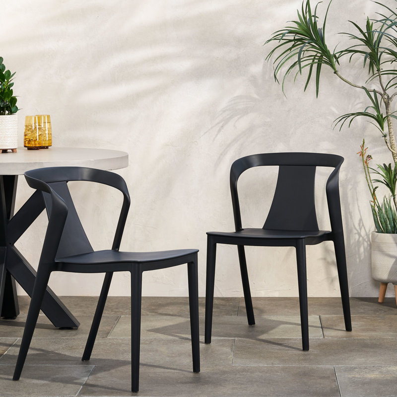 Chaise d'extérieur Unique Weather Outdoor, noire, profondeur 49,2 cm, largeur 53 cm, hauteur 78,5 cm, poids 4,5 kg, forme incurvée pour un jardin élégant, en polypropylène noir, idéale pour les repas ou