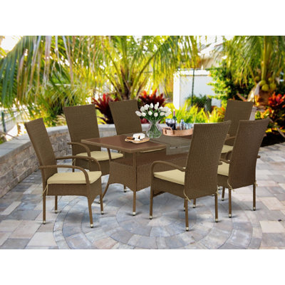 Ensemble de 7 pièces de mobilier de jardin en osier composé d'une table d'extérieur rectangulaire avec plateau en verre et 6 fauteuils de jardin avec coussin