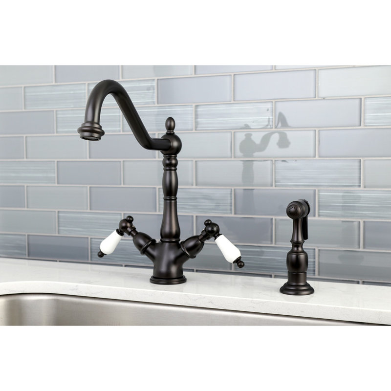 Kingston Brass Heritage Two-Handle 2-or-4 Hole Deck Mount Kitchen Faucet with Brass Sprayer, Oil Rubbed Bronze/White