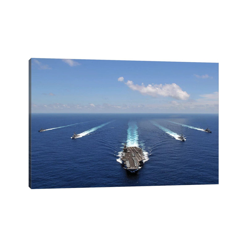 The USS Abraham Lincoln Leading A Formation Of Ships From The Abraham Lincoln Strike Group - Wrapped Canvas Print