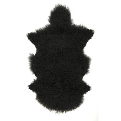 Tapis noir en fourrure d'agneau de Mongolie