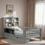 Lit plateforme avec tableau noir, tiroirs de rangement et tablettes ouvertes-722753423-722753422