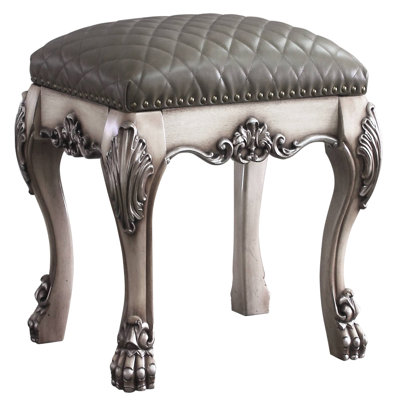 Tabouret de coiffeuse élégant en gris et blanc os rétro pour une chambre à coucher paisible et relaxante