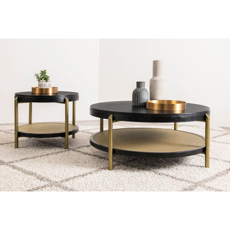 Table basse autoportante ronde noire avec tablette de rangement et pieds en laiton vieilli